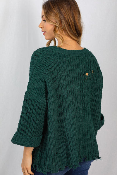 Distressed sweater with pocket